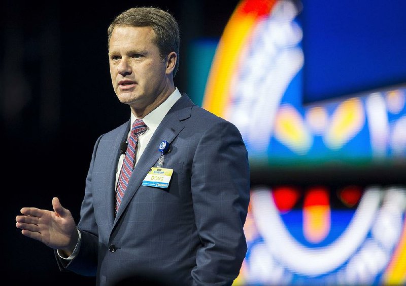 Doug McMillon, chief executive officer, speaks on stage during the annual Wal-Mart Shareholers meeting on Friday, June 5, 2015, at Bud Walton Arena in Fayetteville.