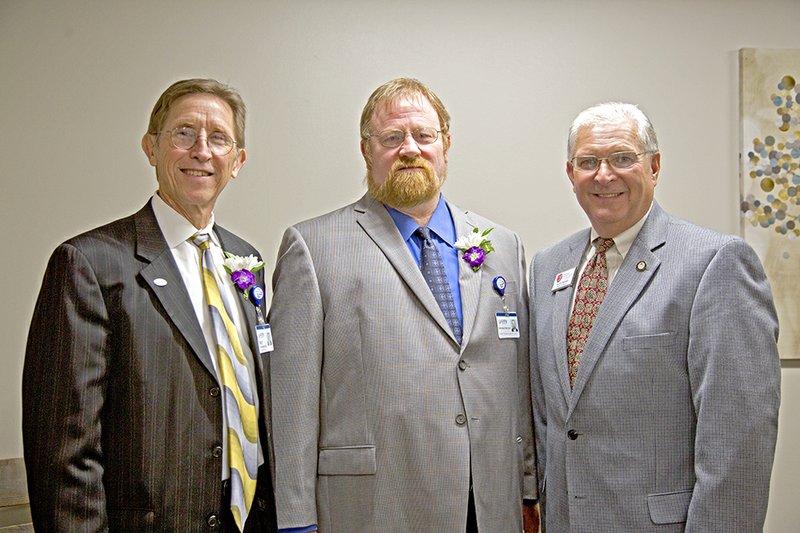 Ray Montgomery, Unity Health president and CEO, from left; Ron Wauters, Unity Health behavioral-health medical director; and Searcy Mayor David Morris stand together at an open house for Unity Health-Courage. Courage is a new inpatient adolescent behavioral-health clinic at Unity Health’s Specialty Care campus in Searcy.