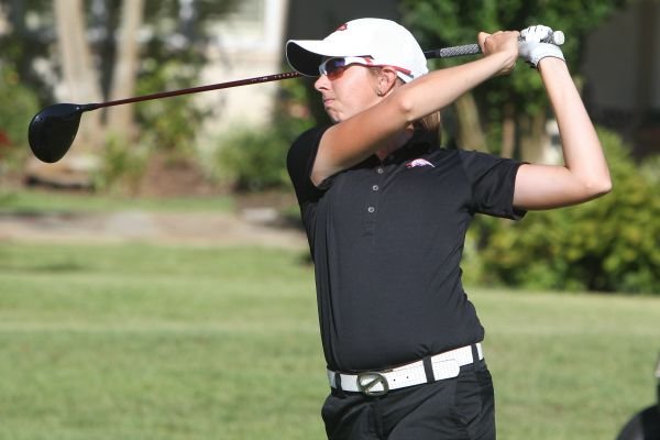 Summar Roachell of Conway tees off on the second tee of the Park Course at Hot Springs Country Club Friday, July 17, 2015, during a semifinal round of match play against Kirsten Garner of Hot Springs.