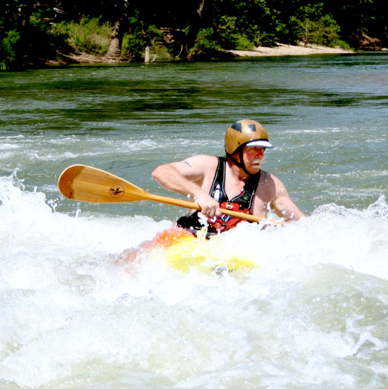 Landon Reeves/Herald Leader Dennis Buccella of the River Valley Chapter of the Arkansas Canoe Club is living proof that a good mustache makes everything cooler.