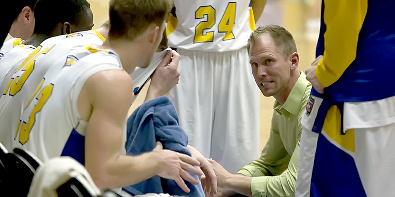 File photo courtesy of JBU Sports Information John Brown University men&#8217;s basketball head coach Jason Beschta led the Golden Eagles to a 16-15 record in his first season in 2014-15.