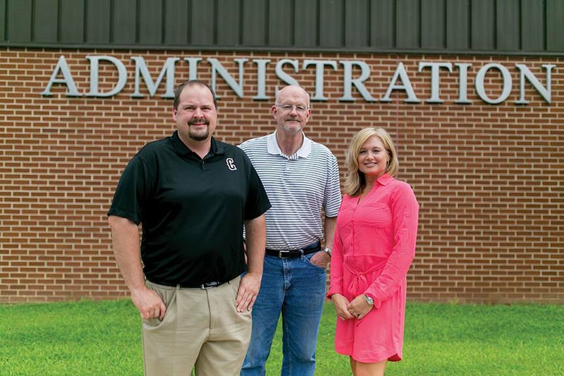 The Clinton School District will begin the school year with three new administrators. From left are Michael Wells, junior high school principal; Anthony Vining, district superintendent; and Caroline Nail, elementary school principal.