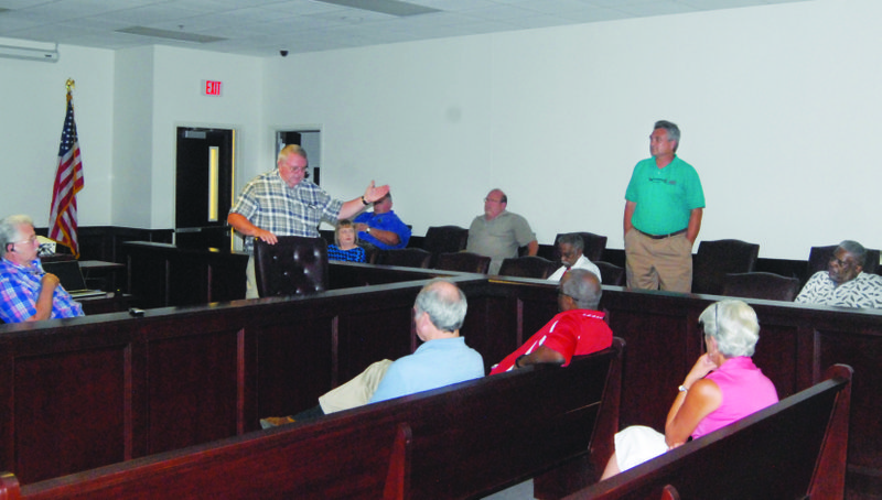 Building for the future
Ouachita County Judge Robbie McAdoo, standing center, introduces Jim Langford, standing at right, with the SpiritArchitecture Group to attendees of a public meeting on Tuesday evening. The meeting was held to provide more insight to residents regarding the expansion of the county jail, the relocating of the district court and the repairs on the roof at the Ouachita County Courthouse. See related article.