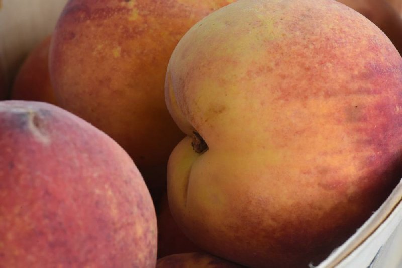 Just peachy: The stone fruit will be celebrated through Sunday at the Johnson County Peach Festival in Clarksville. 