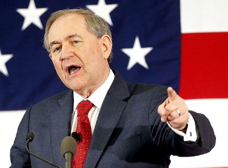 In this April 17, 2015, file photo, former Virginia Gov. Jim Gilmore speaks at a Republican Leadership Summit in Nashua, N.H. 