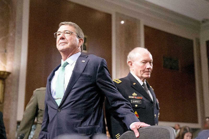 Defense Secretary Ashton Carter (left) and Joint Chiefs Chairman Gen. Martin Dempsey were among officials testifying Wednesday before the Senate Armed Services Committee on military options related to the nuclear deal with Iran. 