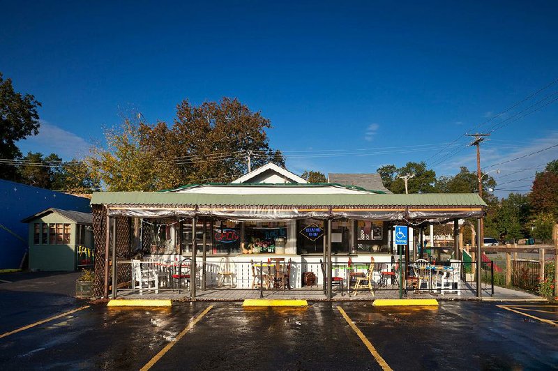 The Root Cafe on Main Street in Little Rock awaits a construction permit before expansion can begin on the kitchen and dining room. 