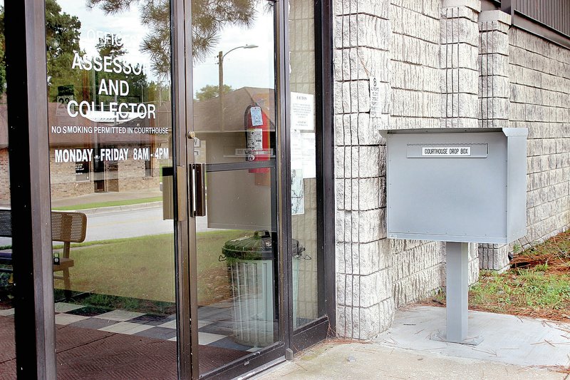 MEGAN DAVIS/MCDONALD COUNTY PRESS A new drop box in front of the McDonald County Courthouse is available for taxpayers who are unable to visit the office during normal business hours, but still need to submit forms to the Collector's or Assessor's offices.