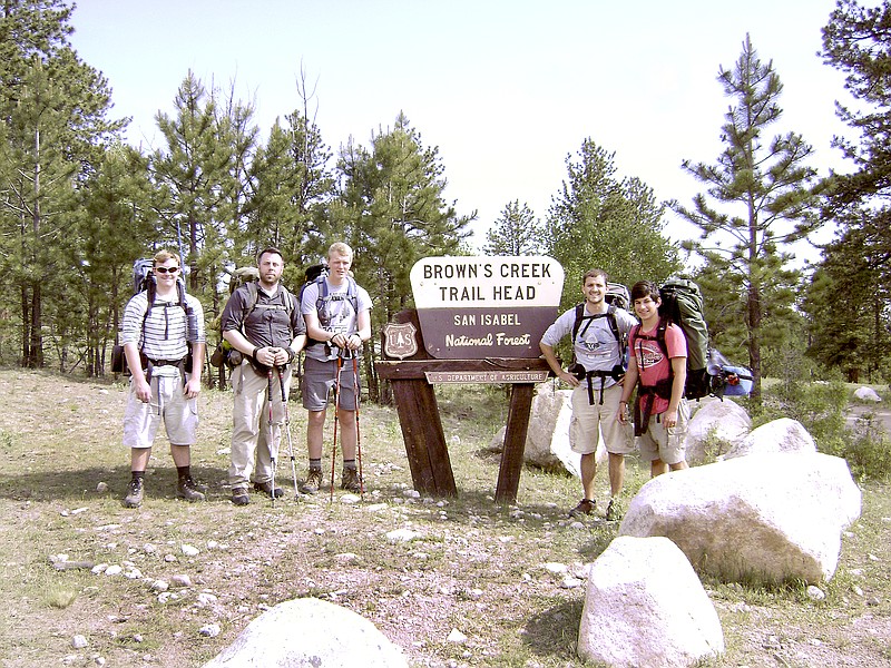 PHOTO SUBMITTED Caleb Kernell, left, Scoutmaster John Martin, Kyle Martin, Committee Chairman Henri Whitehead and Isaac Gardner at a trail head in the San Isabel National Forest.