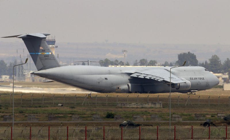 A United States Air Force cargo plane maneuvers on the runway after it landed at the Incirlik Air Base, in the outskirts of the city of Adana, southeastern Turkey, Wednesday, July 29, 2015. 