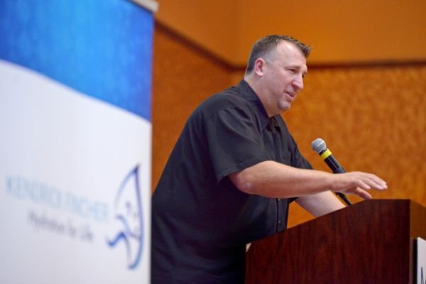 Bret Bielema, Arkansas head coach, speaks on Thursday, July 30, 2015, during the Mercy Coaching Summit at the John Q. Hammons Center in Rogers. Bielema highlighted hydration and player safety.