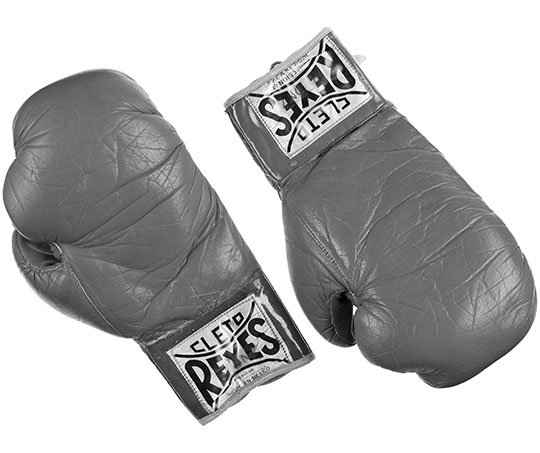 The Associated Press BALBOA V CREED: This photo provided by Heritage Auctions shows the boxing gloves worn by actor Sylvester Stallone in 1979's "Rocky II," which are among more than 1,400 costumes, props and personal items he's consigned to be sold at a public auction by Heritage Auctions in Los Angeles and online, set for Oct. 14-15. A portion of the proceeds will be donated to charities and organizations that assist veterans and wounded U.S. military personnel.
