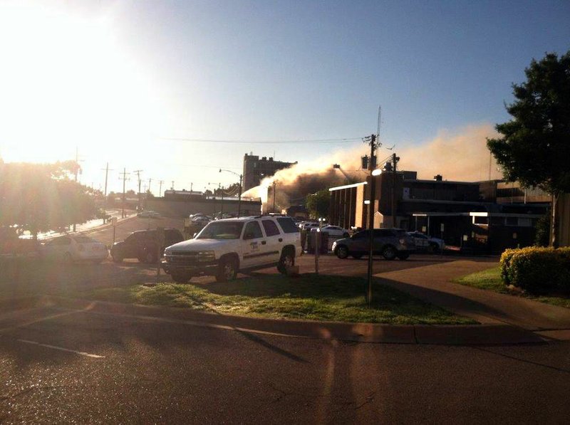 Smoke billows could be seen billowing from two blocks away from a fire in downtown Jonesboro at 7 a.m. Friday, July 31, 2015, 