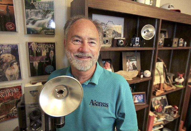 Chuck Haralson is retiring in December as chief photographer of the Arkansas Department of Parks and Tourism. His work has been featured on promotional material for the state, including billboards, postcards and textbooks. 