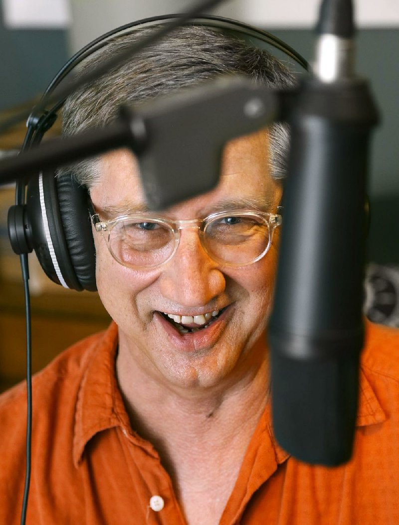 Jim Mize works on a song in his recording studio at his Conway home.