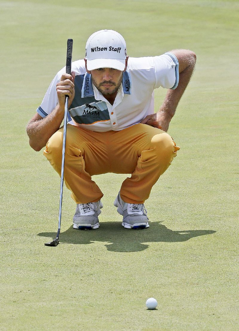 Troy Merritt was seven shots off the lead going into Saturday’s third round, but the 29-year-old shot a tournament-record 10-under 61 to move into a tie atop the leaderboard with Kevin Chappell at the Quicken Loans National in Gainesville, Va.