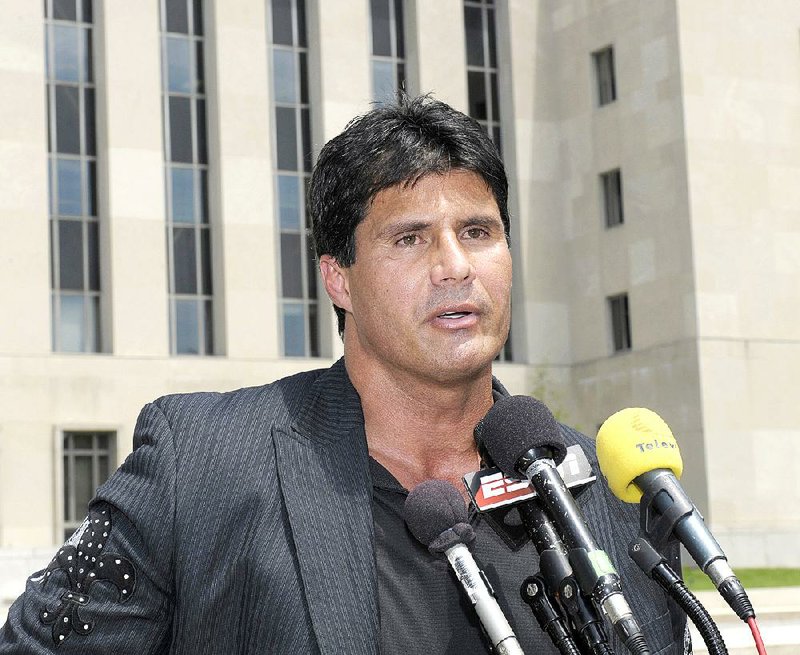 Former baseball star Jose Canseco, shown here in a June 2010 file photo, said he will live as a woman for a week to show support for Caitlyn Jenner’s transition from a male to a female.