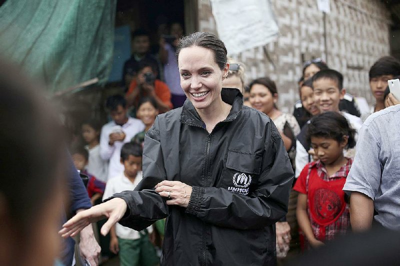 Actress Angelina Jolie Pitt, United Nations High Commissioner for Refugees special envoy and co-founder of the Preventing Sexual Violence Initiative, visits Jan Mai Kaung refugee camp in Myitkyina, Kachin State, Myanmar, Thursday, July 30, 2015. 