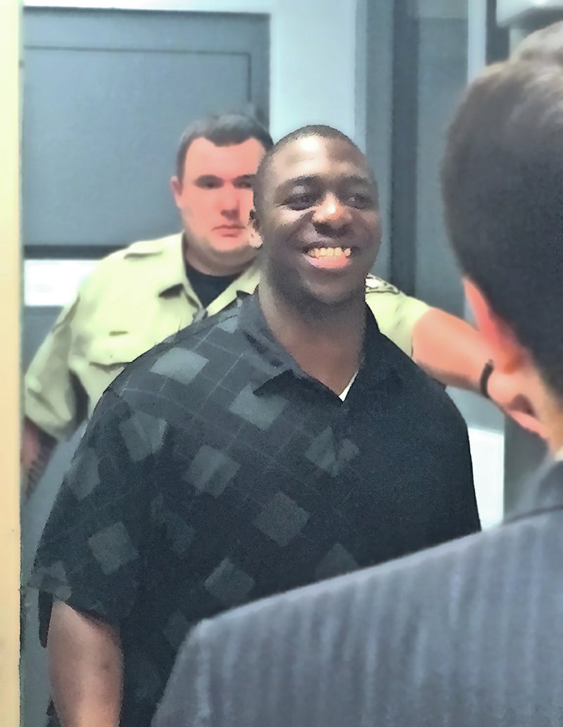 In this file photo Rico Cohn smiles as he is released from the Washington County jail in Fayetteville.