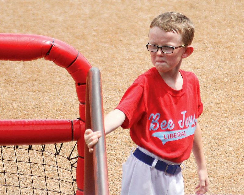 Liberal Bee Jays bat boy Kaiser Carlile, 9, was accidentally hit in the head during Saturday’s game against the San Diego Waves at the National Baseball Congress World Series in Wichita, Kan. Kaiser, who was wearing a helmet, died Sunday.