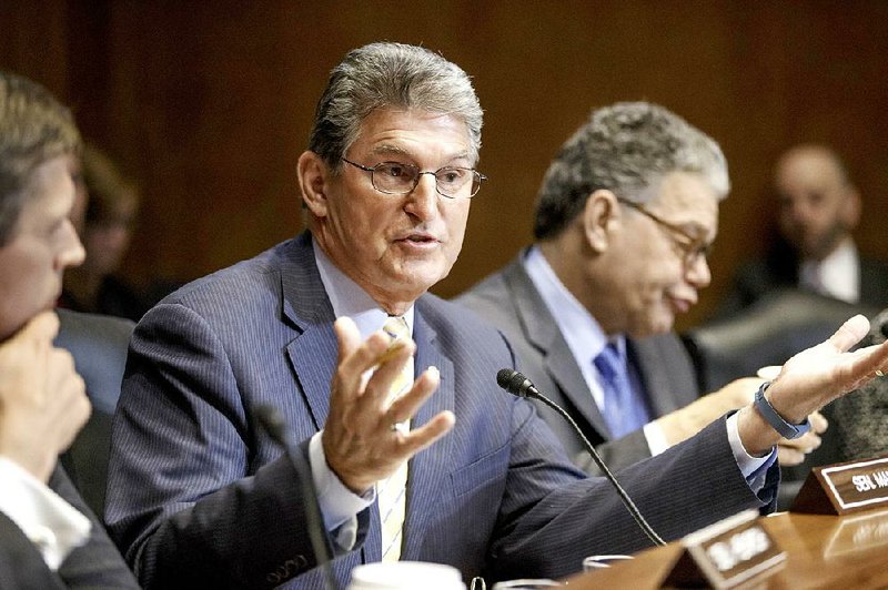 Sen. Joe Manchin, D-W.Va., shown here in a January file photo, was one of two Democratic senators who joined Republicans in an unsuccessful vote to advance a bill cutting off federal aid for Planned Parenthood.