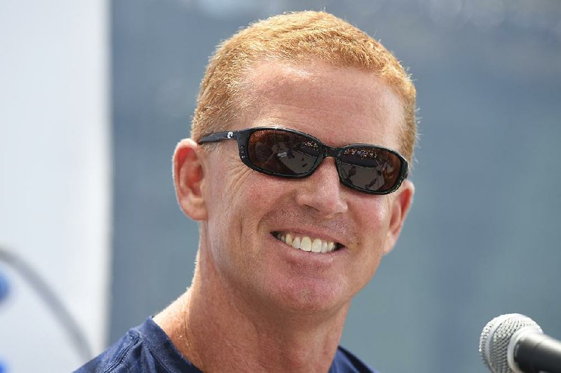 Dallas Cowboys head coach Jason Garrett answers a question during the "state of the team" news conference at the start of Dallas Cowboys' NFL training camp, Wednesday, July 29, 2015, in Oxnard, Calif. 
