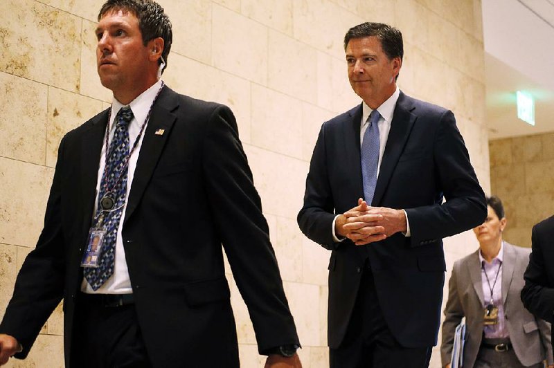FBI Director James Comey (center) said during the Aspen Security Forum in Colorado in late July that the Islamic State, not al-Qaida, posed the greatest threat inside the United States. “It’s currently the threat that we’re worrying about in the homeland most of all,” he said.
