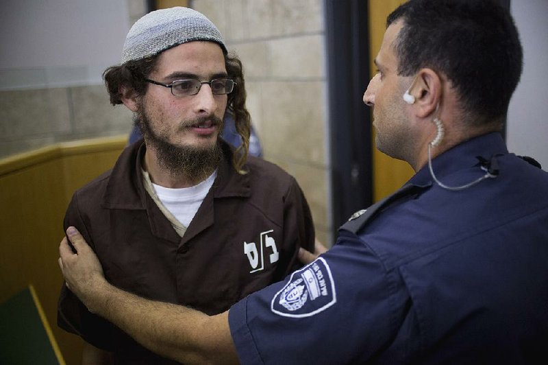 Meir Ettinger appears in court in Nazareth Illit, Israel, on Tuesday.