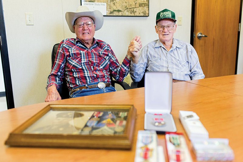 Doyle Jolly, left, and Paul Hallum, both of Greenbrier, are decorated World War II veterans. Although both grew up in Faulkner County and served in similar battle campaigns, they had never met until recently.