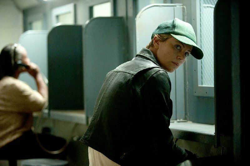 Libby Day (Charlize Theron) agrees to revisit a 25-year-old crime in Dark Places, French director Gilles Paquet-Brenner’s take on the Gillian Flynn best-seller.

