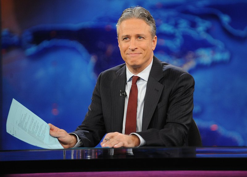 This Nov. 30, 2011, file photo shows television host Jon Stewart during a taping of "The Daily Show with Jon Stewart" in New York. 