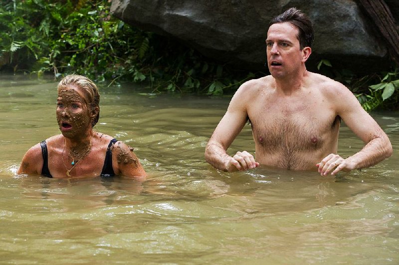 Christina Applegate (as Debbie Griswold) and Ed Helms (as Rusty Griswold) realize they’re not really bathing in Hot Springs’ famed waters during a scene in "Vacation."