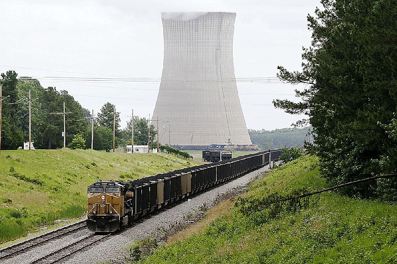 A coal train stops near White Bluff power plant near Redfield, Ark., Monday, June 2, 2014. (AP Photo/Danny Johnston)