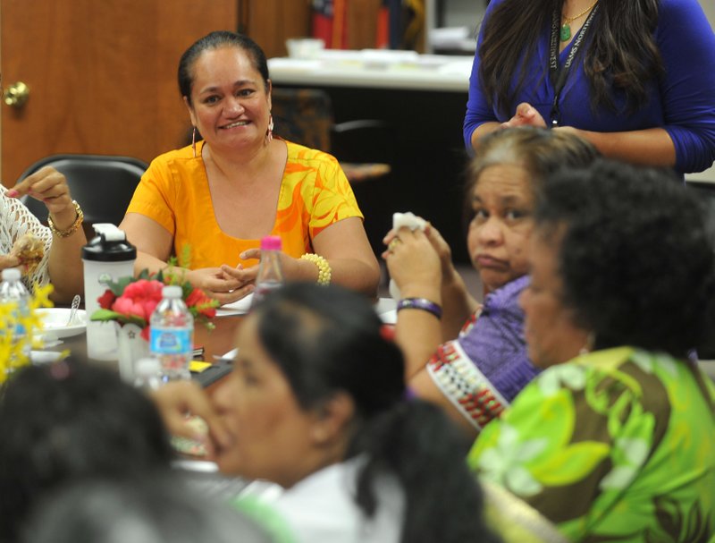 Nia Aitaoto, talks to a group of Marshallese women July 28 during a lunch meeting at the Marshallese consulate office in Springdale. Aitaoto will help run the nation’s first Center for Pacific Islander Health.