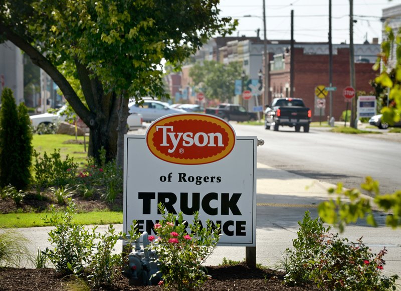 A sign marks the East Walnut Street truck entrance Friday at the Tyson Foods facility in downtown Rogers. For more photos, go to www.nwadg.com/photos.
