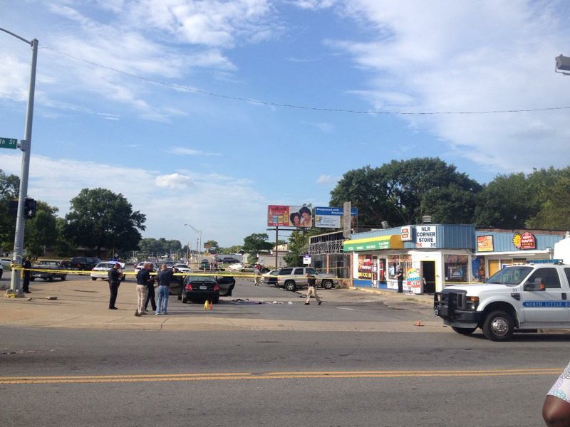 Police investigate a reported double-shooting in North Little Rock Monday.