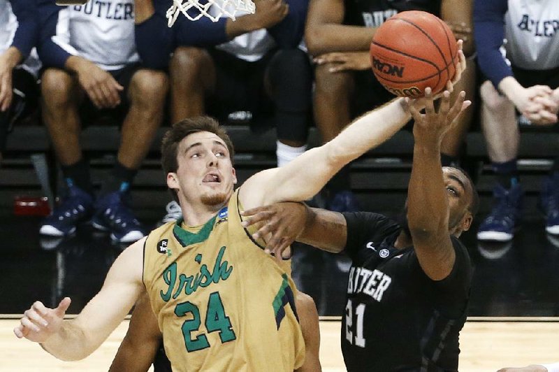 Former Notre Dame star Pat Connaughton (24) has chosen taking jump shots in the NBA over throwing 96 mph fastballs in professional baseball. 