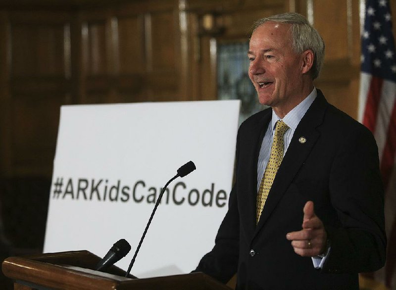 Gov. Asa Hutchinson discusses his computer science initiative for the state’s schools Tuesday afternoon at the state Capitol.
