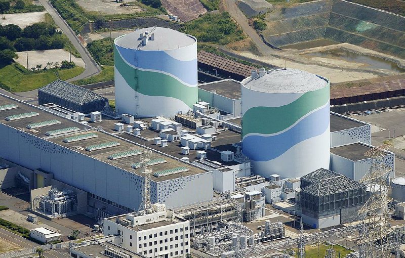 This aerial photo shows reactors No. 1 (right) and No. 2 (left) at the Sendai Nuclear Power Station in Satsumasendai, Kagoshima prefecture, southern Japan, on Tuesday. 