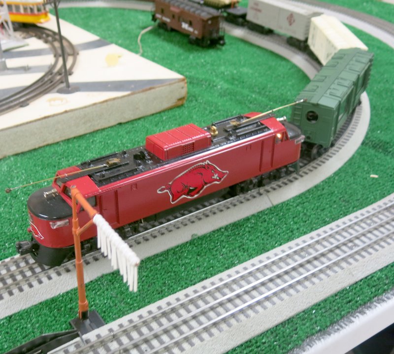 Photo by Susan Holland The custom-painted Razorback locomotive which headed up Mitch Marmel&#8217;s Giraffe Express train was a hit with folks who attended the &quot;Living on the Railroad&quot; model train display at the Gravette Historical Museum on Gravette Day Saturday.