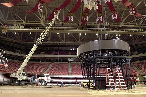 A new scoreboard is constructed on the floor of Bud Walton Arena on Tuesday, Oct. 14, 2003. 
