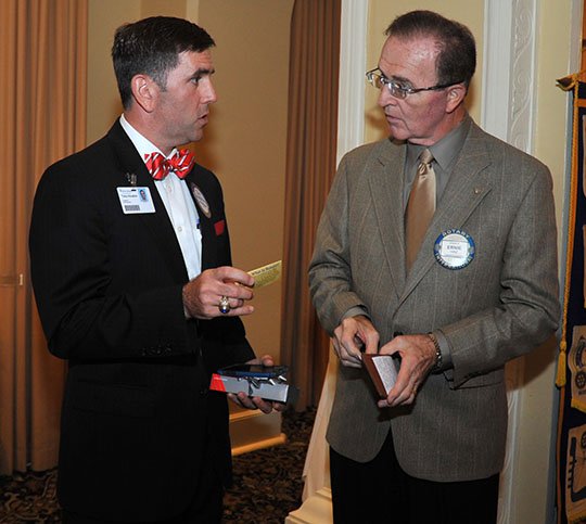 The Sentinel-Record/Mara Kuhn ROTARY VISIT: Tony Houston, president of CHI St. Vincent Hot Springs, speaks with Ernie Hinz, Hot Springs National Park Rotary Club president, following his presentation to the club's weekly meeting Wednesday at the Arlington Resort Hotel & Spa.