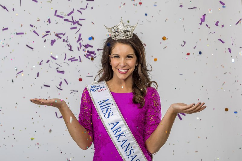 NWA Democrat-Gazette/JASON IVESTER Loren McDaniel is having fun at work as Miss Arkansas 2015.