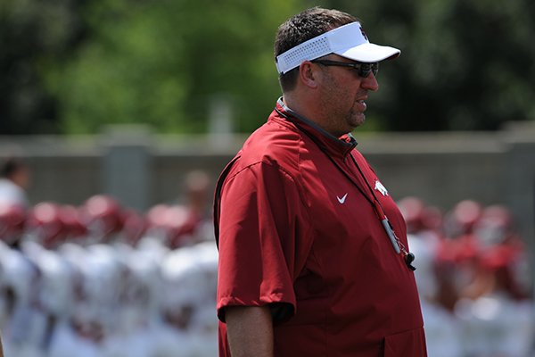 Arkansas coach Bret Bielema watches his payers Saturday, Aug. 8, 2015. during practice at the university football practice field in Fayetteville.