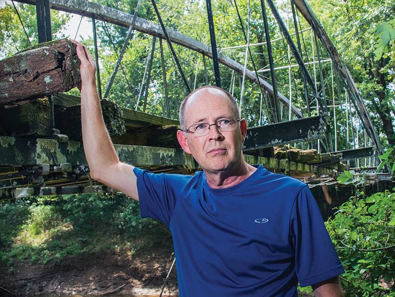 Kenneth Barnes, a member of the Faulkner County Historical Society, heads up the effort to save the Springfield-Des Arc Bridge, which was built in 1874 on the north branch of Cadron Creek, which separates Faulkner and Conway counties.