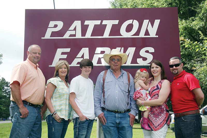 The Gary Patton family of Wooster is the 2015 Faulkner County Farm Family of the Year. The family includes, from left, Todd Patton, Tammy Patton, Colton Patton, Gary Patton, Jennifer Merritt holding 2-year-old Olivia, and Daniel Merritt. The Pattons have a cattle operation, as well as trucking and mini-storage businesses. 