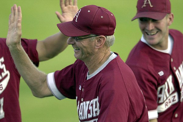 Arkansas coach Norm DeBriyn is introduced prior to an NCAA super regional game against Clemson on Friday, June 7, 2002, in Clemson, S.C.