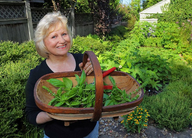 Phyllis Barrier enjoys her vegetable garden in the Prospect Terrace neighborhood in Little Rock.