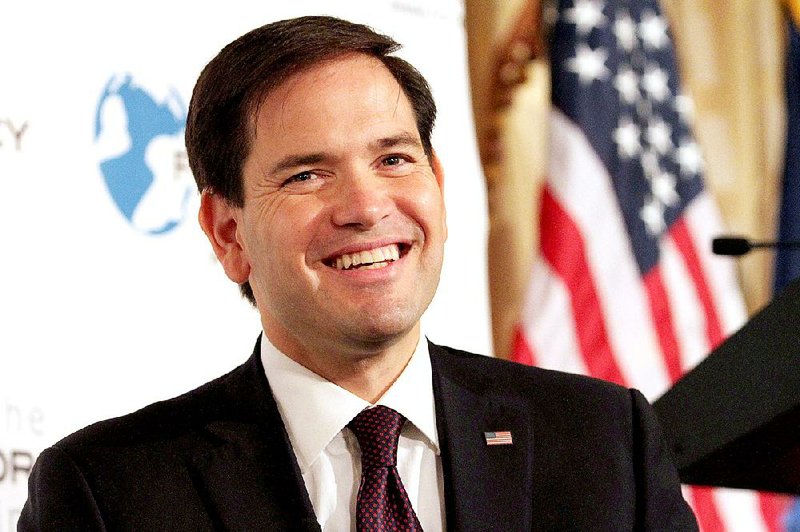 Republican presidential candidate, Sen. Marco Rubio, R-Fla. smiles while speaking during an event hosted by the Foreign Policy Initiative, Friday Aug. 14, 2015, in New York. 