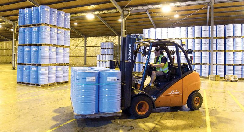 A forklift driver moves barrels of milk fat at Fonterra Cooperative Group Ltd.’s milk processing facility in Te Awamutu, New Zealand, in this file photo. Demand for dairy fats is tightening supply of the cream used to make ice cream and butter. 